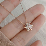 Gold and Silver Crystal Necklace Adorned with Sparkling Snowflakes