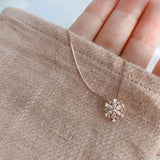 Gold and Silver Crystal Necklace Adorned with Sparkling Snowflakes