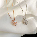 Gold and Silver Crystal Necklace Adorned with Sparkling Snowflakes