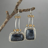 Classic Silver Earrings Featuring Black Gemstone